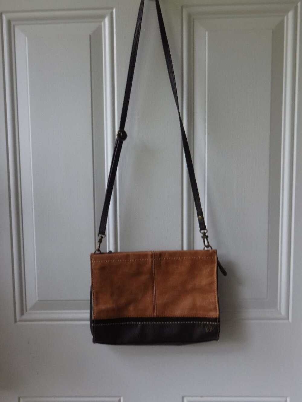 The Sak cross body leather purse, copper metalic detail, small outside pocket